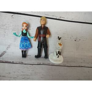 Frozen figures Anna Kristoff and Olaf cake toppers